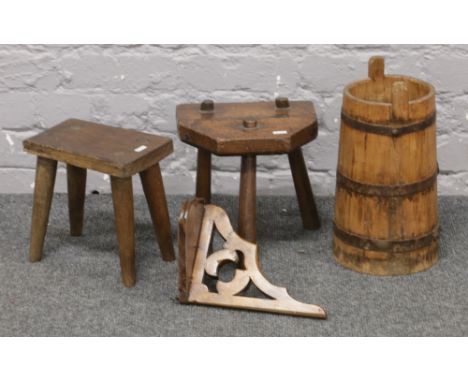 A metal bound milk churn, mahogany corner shelf bracket and two milking stools.&nbsp;