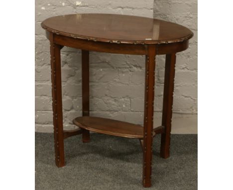 A George V mahogany occasional table.