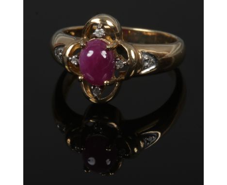 A 9ct gold cabochon, ruby and diamond ring, size O.