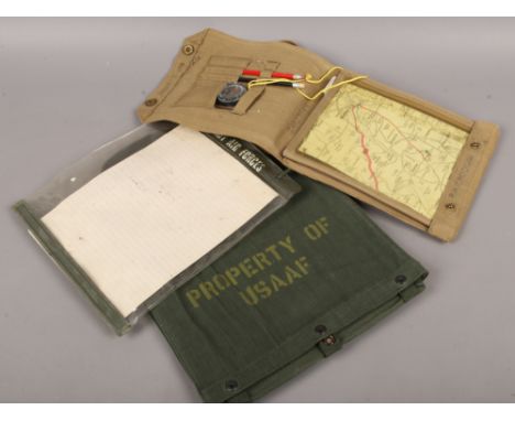 Three World War II military map cases, two for USA AF, two with military broad arrow stamps.