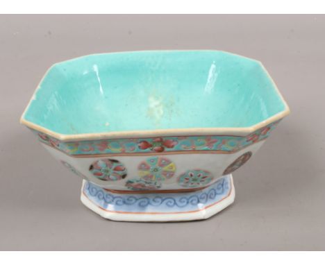 An antique Chinese square cantered bowl painted with coloured enamels, seal mark to base.