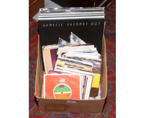 A box of mainly rock L.P and single records to include AC/DC, The Rolling Stones, Deep Purple etc.