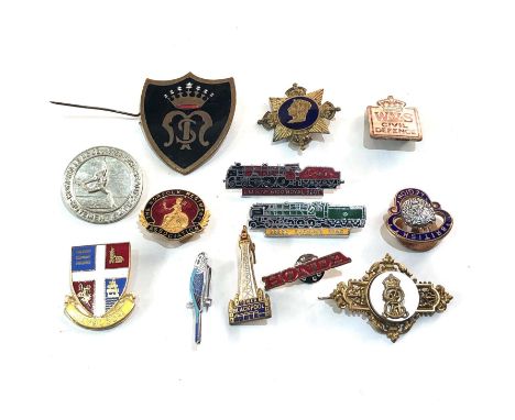 Selection of badges includes enamel badges etc 