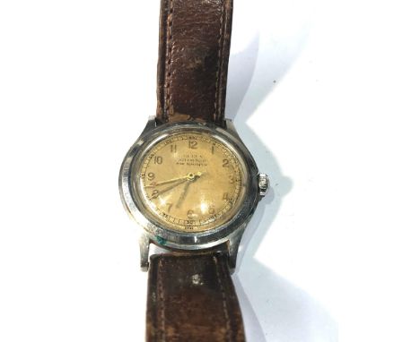Buren small case gents vintage military style wristwatch  the watch is ticking but no warranty is given 