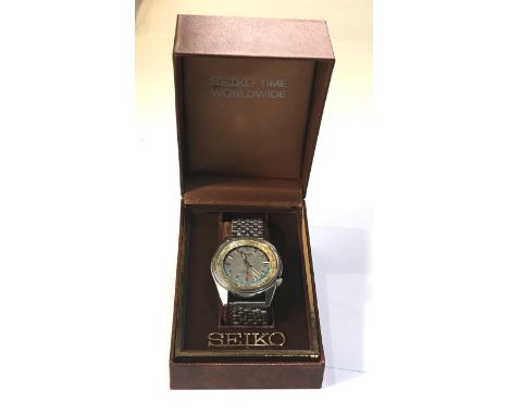 Vintage Seiko world time 6117-6019 automatic wristwatch in original box the watch does tick but no warranty given glass scrat