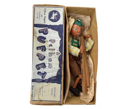 A boxed Pelham SS Tyrolean Boy marionette puppet
