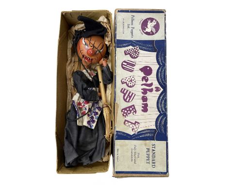 A boxed Pelham SM Witch marionette puppet