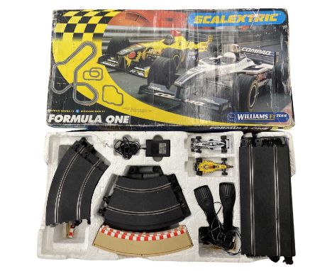 A boxed Scalextric set, Formula One: Jordan Honda F1 v Williams BMW F3(unchecked for completeness)