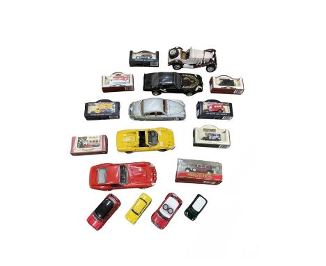 A mixed lot of various large unboxed die-cast sports cars and boxed model cars.