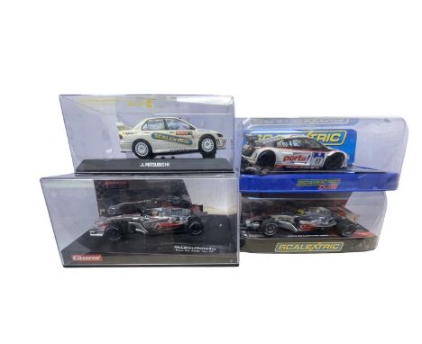 A pair of cased Scalextric cars, plus 2 other models