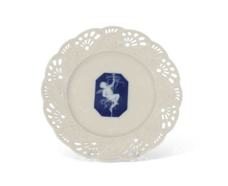 19th century Minton plate, the centre with a shaped panel with pate-sur-pate decoration of a cherub, signed A Birks, within m