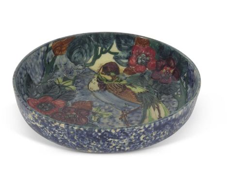 Large bowl with tube lined Art Nouveau design of a bird amongst foliage, signed by R Dean, unmarked, possibly for Forrester &