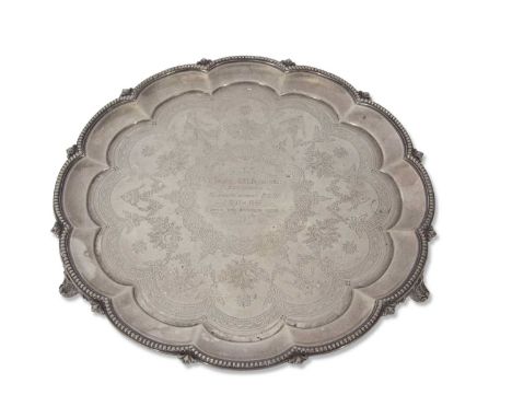Victorian presentation salver of lobed circular form, having beaded and arrow inset rim, the foliate engraved field featuring