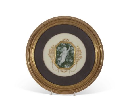 Circular plaque, the centre modelled with a pate-sur-pate panel of a cherub on green ground surrounded by gilt border, the ba