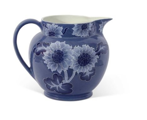 A large Bursley ware jug probably by Charlotte Rhead decorated with tubelined floral design in blue pattern number 267 factor