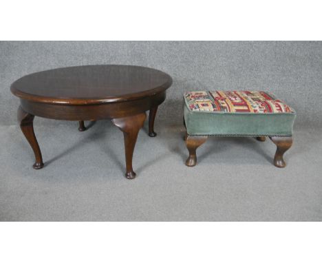 A Georgian style mahogany coffee table along with a tapestry upholstered footstool. h37 d68 