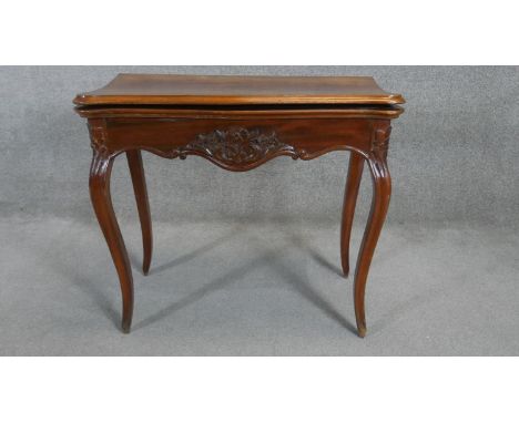 A 19th century mahogany serpentine fronted card table on cabriole supports. H.72 W.80 D.40 (D.80 when open) 