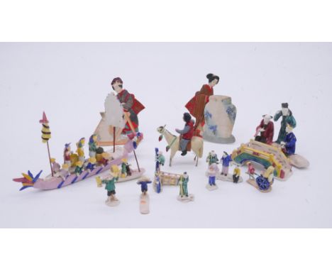 A collection of Chinese hand painted ceramic miniature figures along with a painted festival scene on silk and two silver and