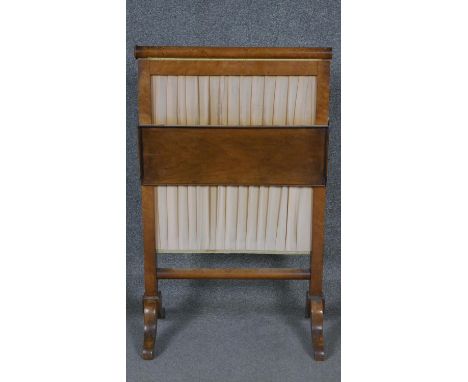 An early 19th century burr maple fire screen with sliding pleated panel and adjustable shelf. W.53 H.88 