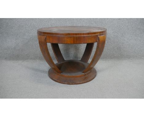 An Art Deco burr walnut lamp table on shaped supports resting on a stepped base. H.46 D.64CM 