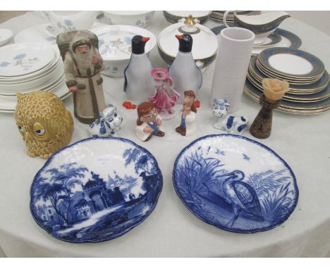 A quantity of ceramics to inc a Tetley cruet by Wade and a Penguin decanter by Lomonosov etc