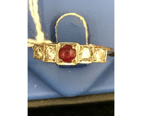 An Art Deco diamond and ruby dress ring