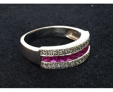 An 18ct diamond and ruby dress ring