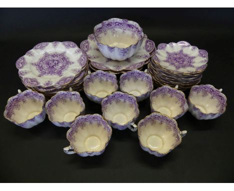 A Victorian Wileman Foley China thirty four piece tea serviceComprising nine cups, eleven side plates, twelve saucers, two ca