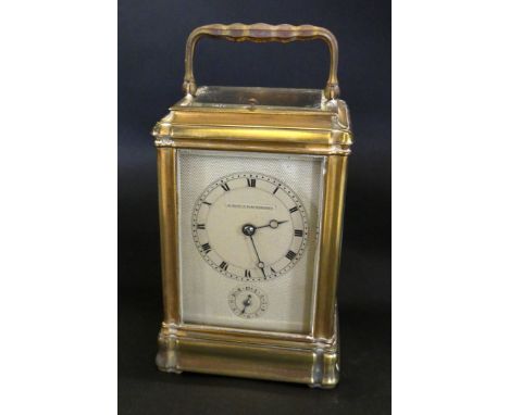 A 19th Century French brass cased repeater carriage clockWith engine turned face and Roman numeral dial with subsidiary hour 