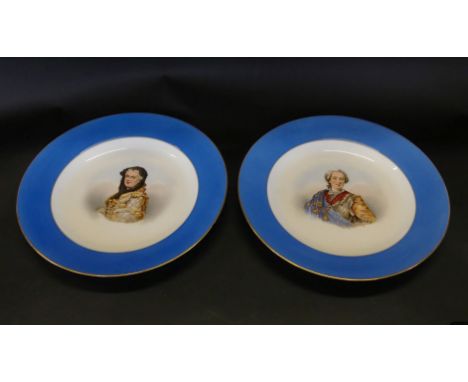 A pair of 19th Century French ceramic wall chargersEach hand painted with busts of Louis XV & Marie Leszczynska, diameter 31c