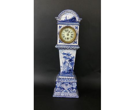 A late 19th Century Delft tin glazed porcelain mantel clockDecorated with figures in landscape scene, with floral decoration,