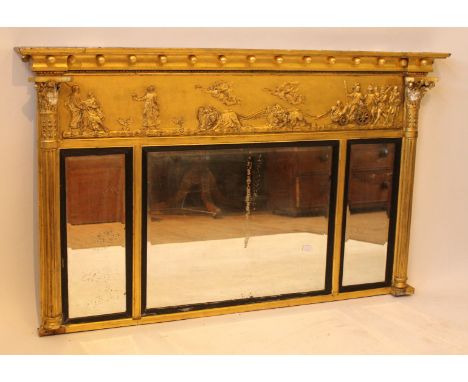 A large 19th Century three glass over mantel mirrorIn gilt frame with Corinthian column supports and decoration of classical 