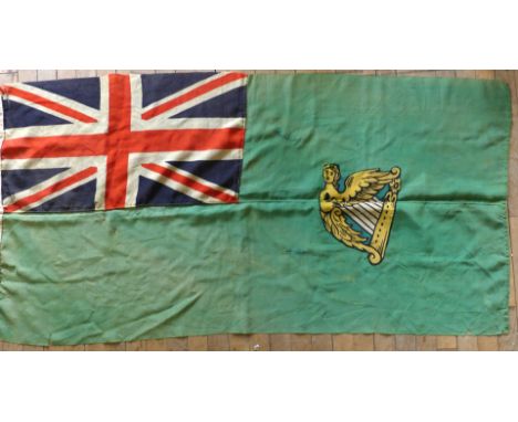 A pre 1922 Irish green Ensign flagWith gold winged Hibernia harp and Union Jack, height approx 92cm, length approx 179cm (af)