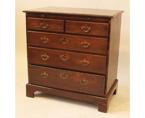 A Georgian mahogany batchelors chestFitted with brushing slide over two short and three long drawers, raised on bracket feet,