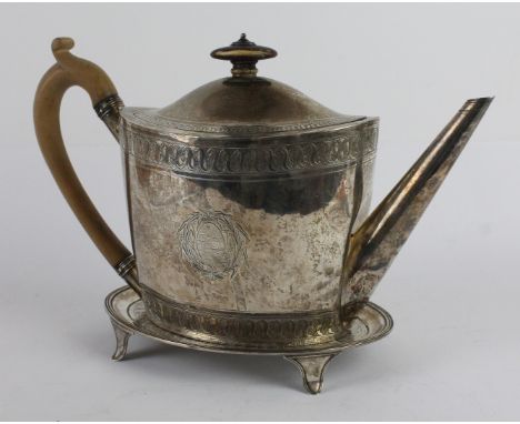 A George III silver teapot and standOf navette form, with engraved stylised scroll rims, the domed lid with a wooden oval fin