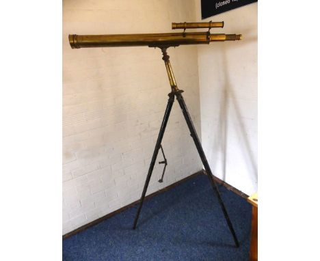 A late 19th/20th Century brass telescope The 92cm cylinder with an 8cm lense fitted with subsidiary star finder telescope tog