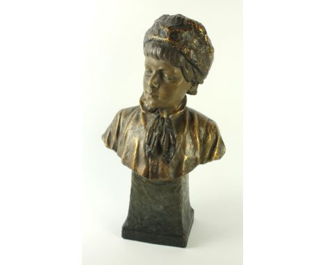 A 19th Century Goldscheider bust Modelled in the form of a head and shoulders bust of a boy, impressed and embossed factory m