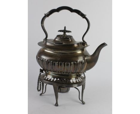 An Edwardian silver spirit kettle and stand Of conventional form, with a fluted lower body and a reeded handle, with a domed 