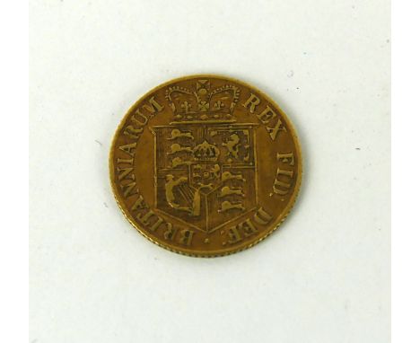 A George III gold half sovereign, dated 1817   CONDITION REPORT:  Wear to surface, light scratches See photos