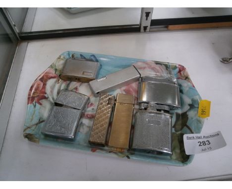 tray of 7 vintage lighters