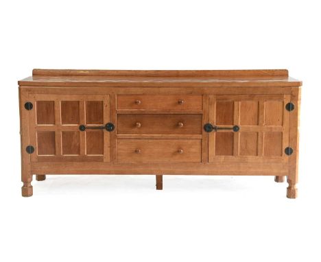 Workshop of Robert Mouseman Thompson (Kilburn): An English Oak 6ft Sideboard, 1970s, with raised upstand, adzed top over two 