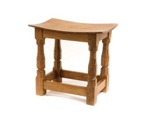 Workshop of Robert Mouseman Thompson (Kilburn): An English Oak Dish Top Stool, the rectangular nailed and adzed top, on four 