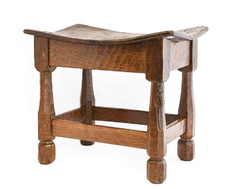 Robert Mouseman Thompson (1876-1955): A Burr Oak Dish Top Stool, with nailed top, on four octagonal legs, joined by stretcher