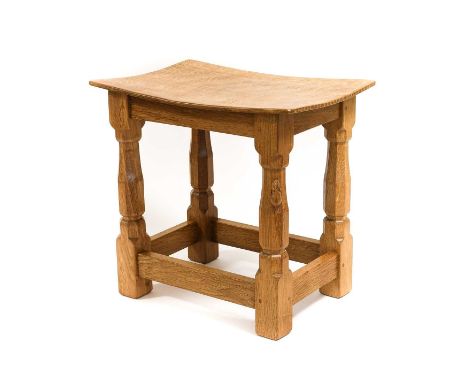 Workshop of Robert Mouseman Thompson (Kilburn): An English Oak Dish Top Stool, the rectangular nailed and adzed top, on four 