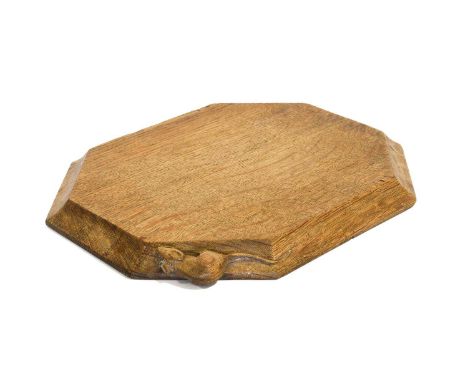 Workshop of Robert Mouseman Thompson (Kilburn): An English Oak Bread Board, of octagonal form, with carved mouse trademark,30