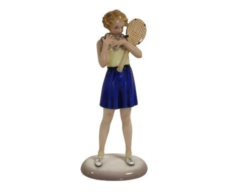 An Art Deco Goldscheider Figure, designed by Josef Lorenzl, model 8473, a female tennis player, on an oval base, impressed, p