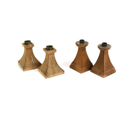 Workshop of Robert Mouseman Thompson (Kilburn): Two Pairs of English Oak Altar Candlesticks, circa 1960s/70s, of tapering for