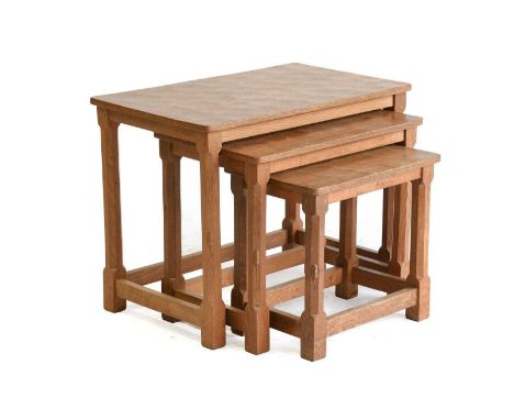 Workshop of Robert Mouseman Thompson (Kilburn): An English Oak Nest of Three Tables, adzed rectangular tops, on four octagona