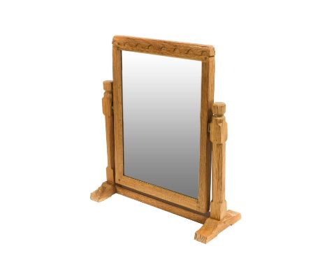 Workshop of Robert Mouseman Thompson (Kilburn): An English Oak Stand Mirror, the rectangular mirror pivots between two octago