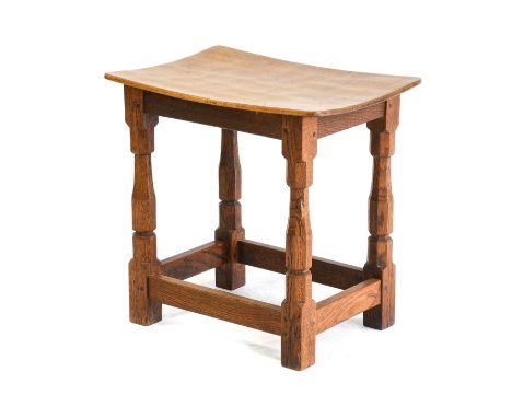 Workshop of Robert Mouseman Thompson (Kilburn): An English Oak Dish Top Stool, the rectangular nailed and adzed top, on four 